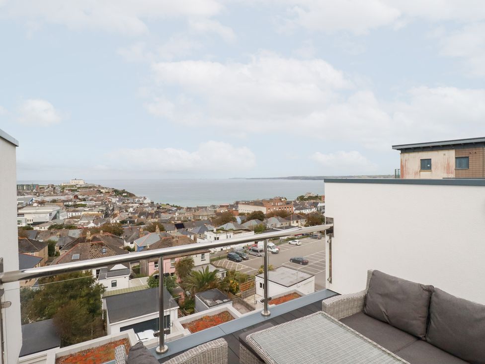 A balcony overlooking the sea and town at 5 Quay Court in Newquay