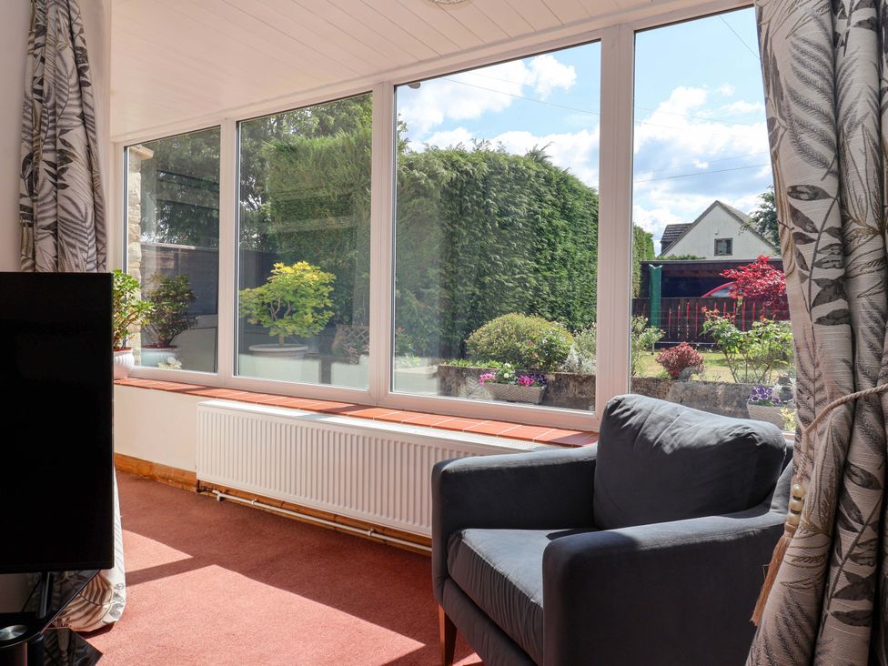 A living room with a window view at 3 Springhaven in Hampsthwaite