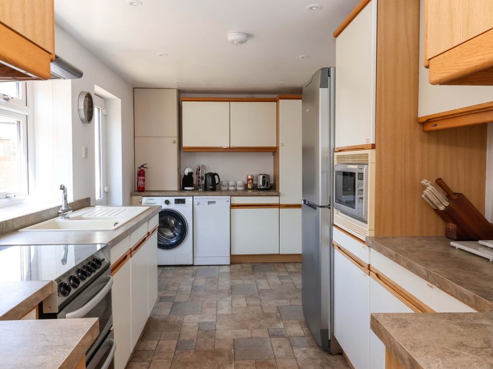 A kitchen with various appliances and fixtures at 3 Springhaven, Hampsthwaite