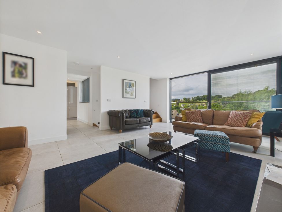 A living room with sofas and a coffee table at Oakwood House in Tansley near Matlock