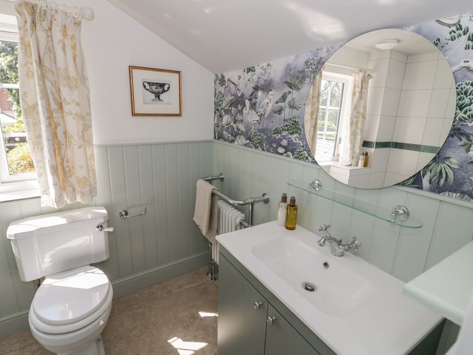 A bathroom with a sink and toilet at Heath Cottage Stratford-Upon-Avon