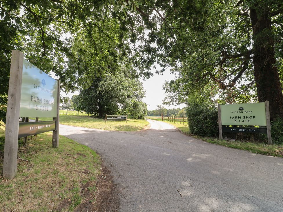 A road leading to Syston Park Farm Shop & Cafe