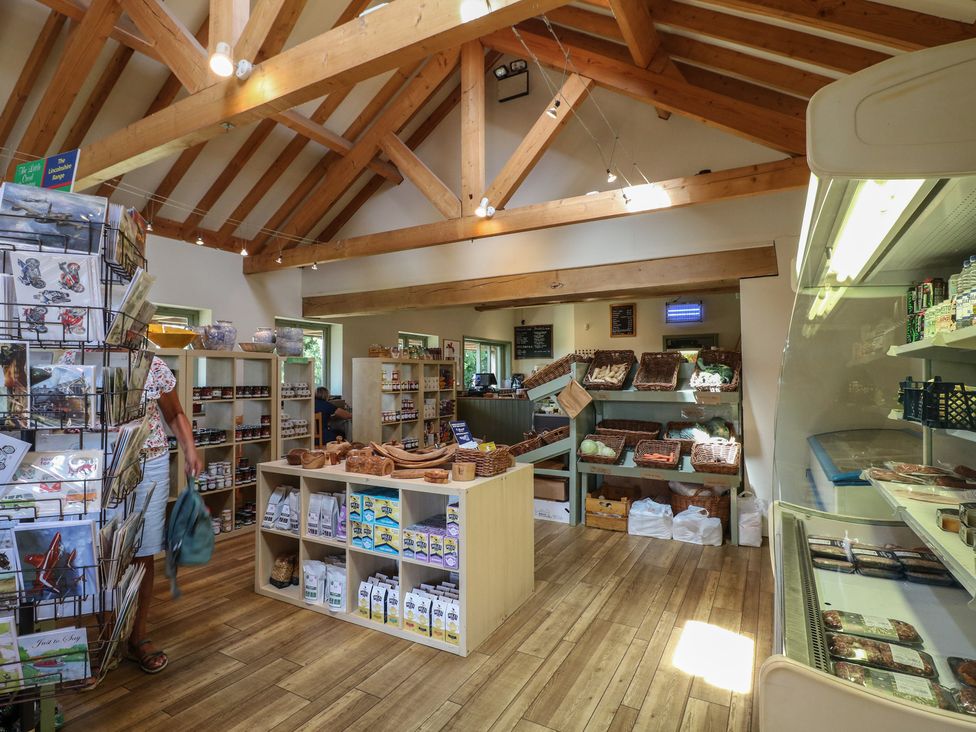 A shop interior with shelves and products at Sunny Cottage in Grantham