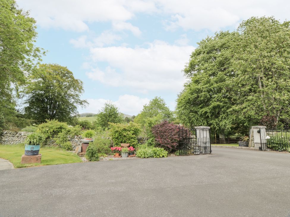 A garden with trees and flowers at Torview House Lyne Station near Peebles