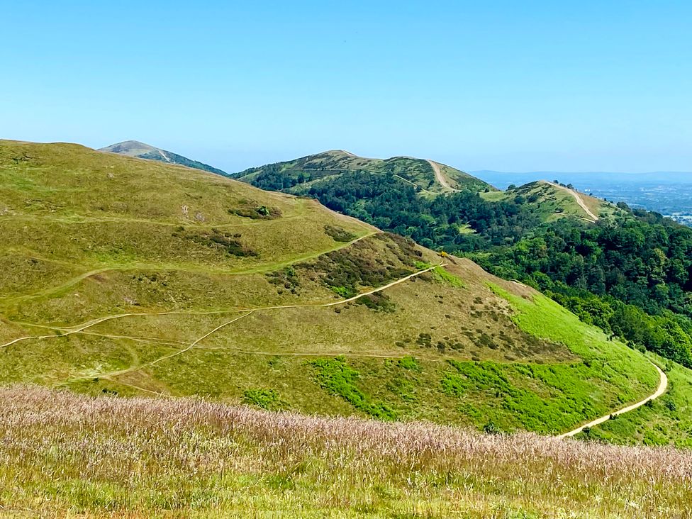 A view of hills and paths in a landscape at The Escape in Malvern