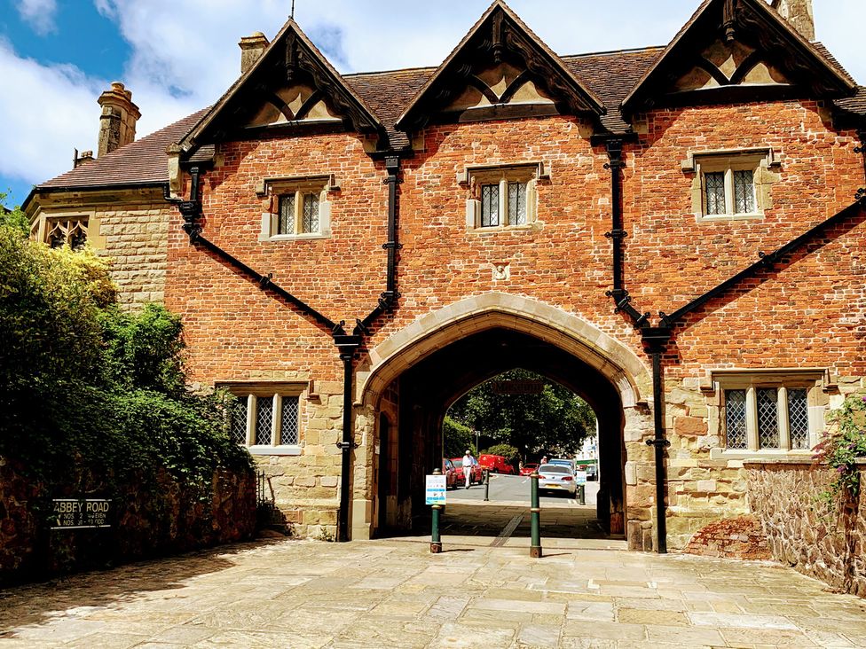 A brick building with archway at The Escape in Malvern