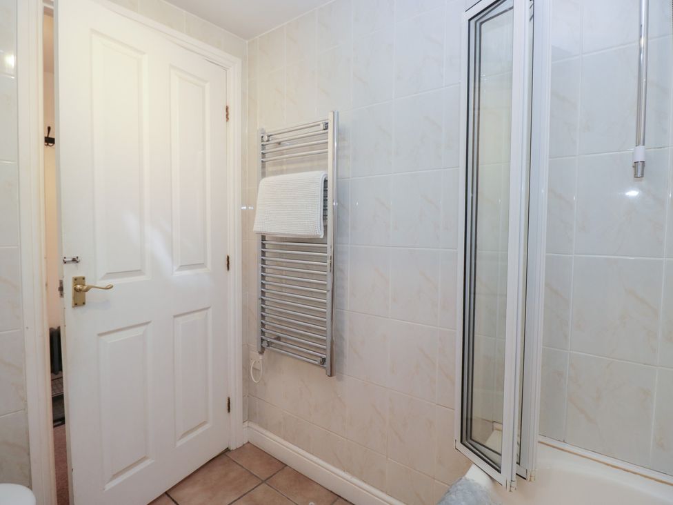 A bathroom with a towel rail and shower at Walkers Retreat in Keswick