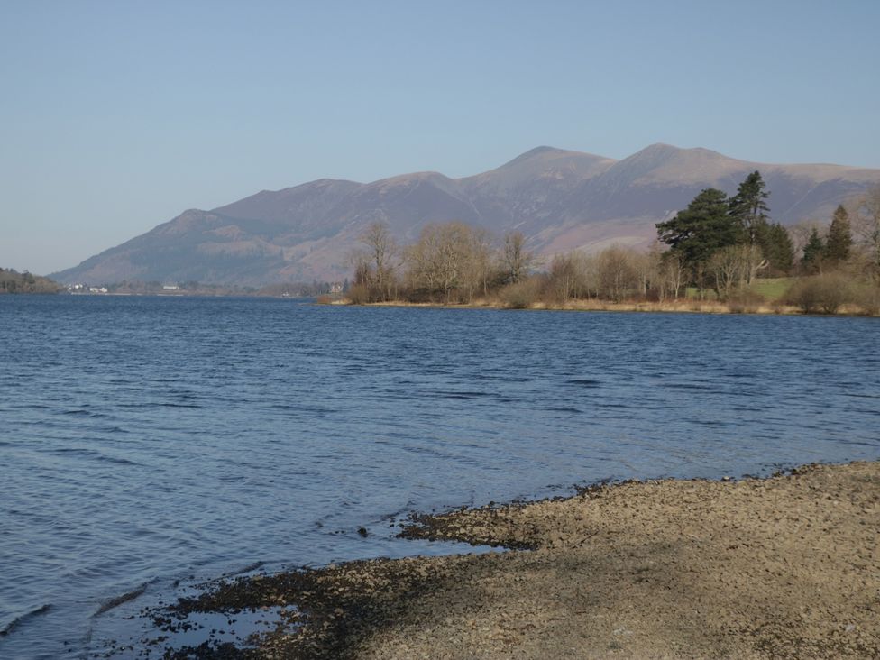 A water view with mountains and trees at Walkers Retreat in Keswick