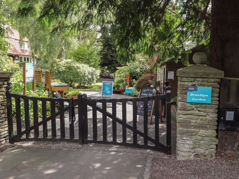 A black gate leading into Branklyn Garden in Perth