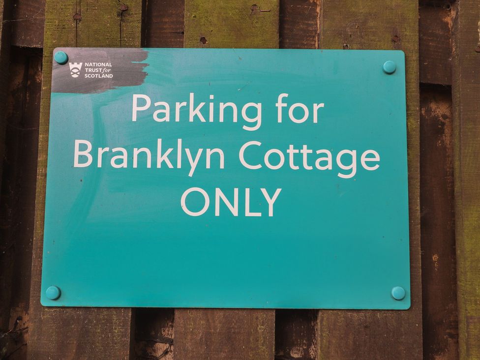 A parking sign for Branklyn Cottage at Branklyn Garden Cottage in Perth