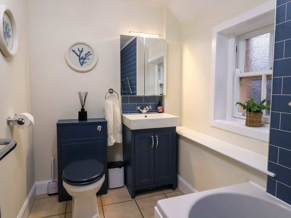 A bathroom with a sink and toilet at Paye House - Cromarty