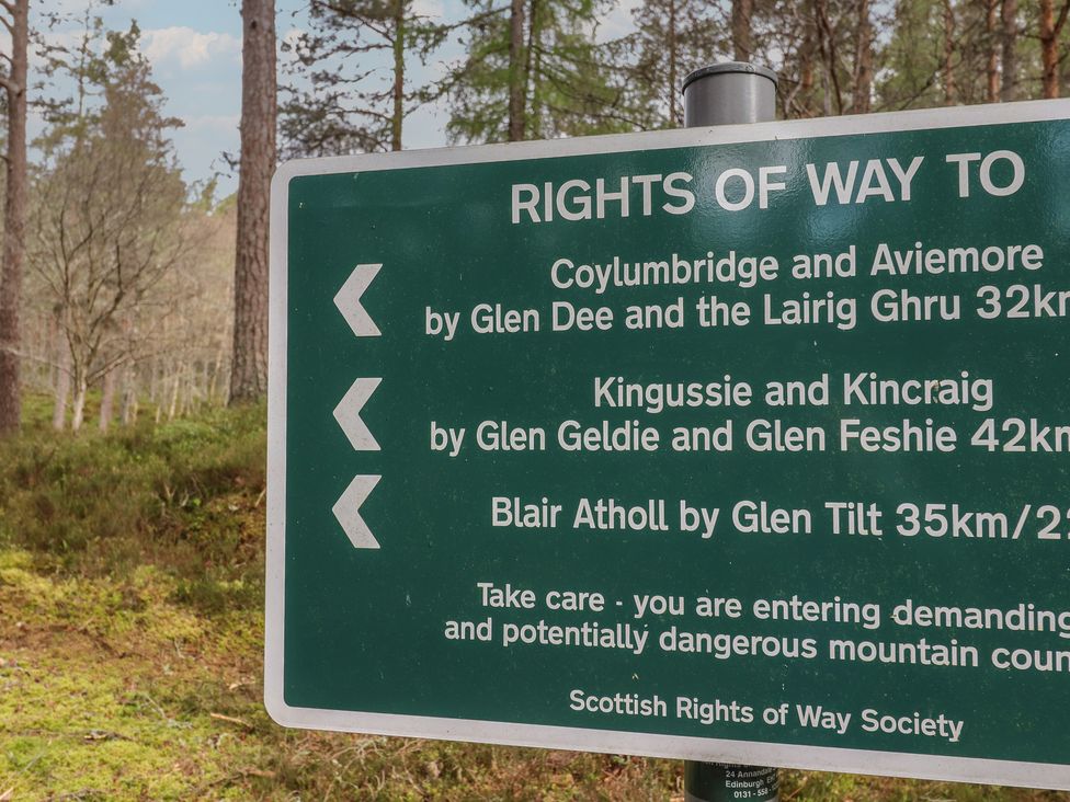 A sign for rights of way in a forest area at Macdui - Mar Lodge Estate, Braemar
