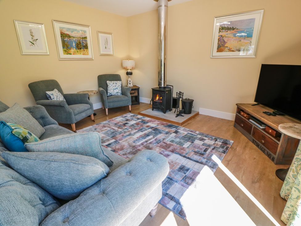 A living room with a sofa and armchairs at Ardlochan Lodge - Culzean Castle Maybole