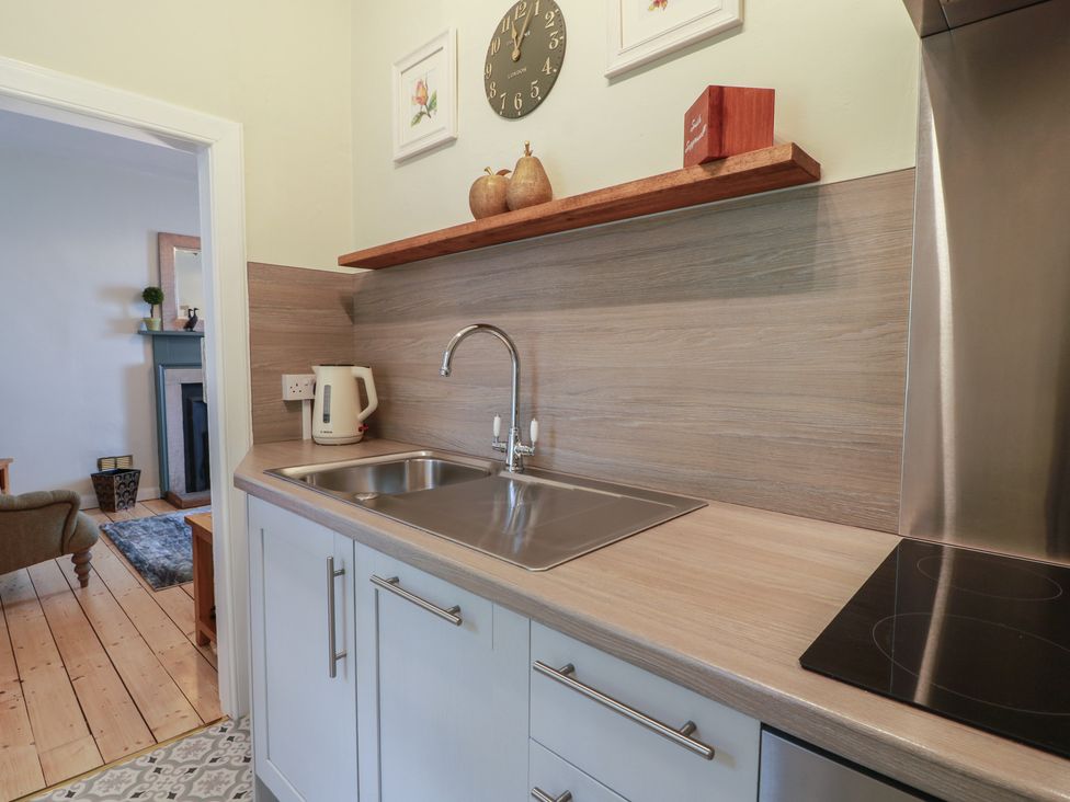 A kitchen with a sink and kettle at South Segganwell - Culzean Castle in Maybole