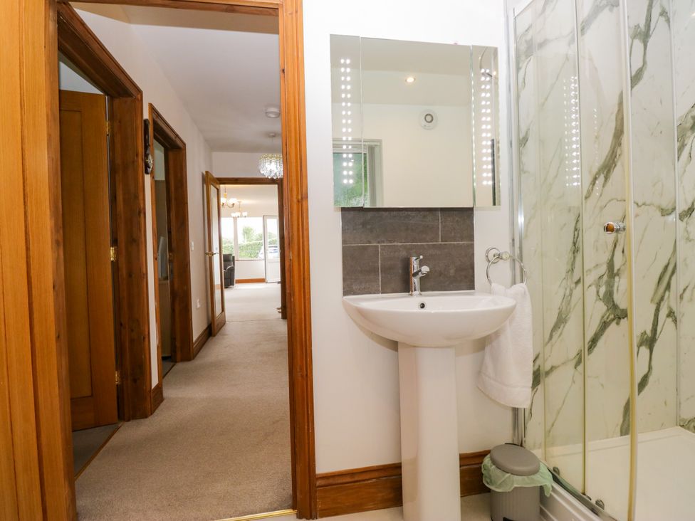 A bathroom with a sink and shower at Sherriff, Troutbeck, near Keswick