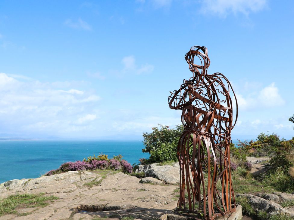 A sculpture overlooking the ocean at Afallon in Llanbedrog