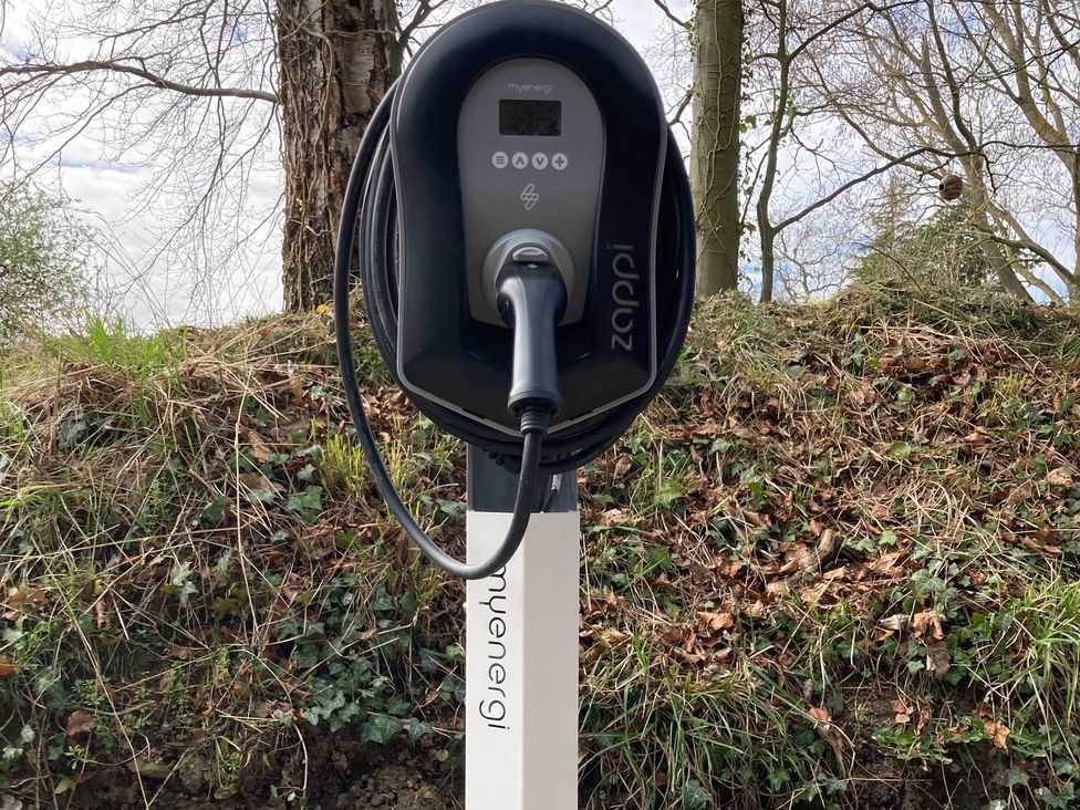 An electric vehicle charger mounted on a post outdoors at Beechwood Cottage Easby near Great Ayton