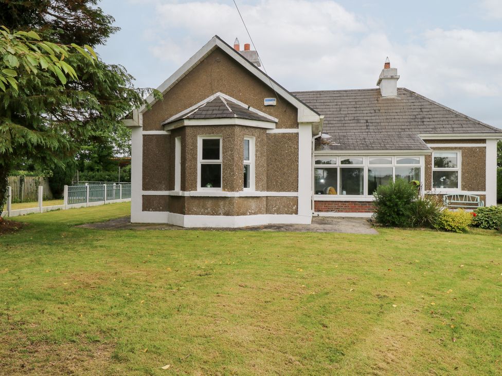 A house with windows and a garden at Churchfield House Moygownagh near Crossmolina, County Mayo