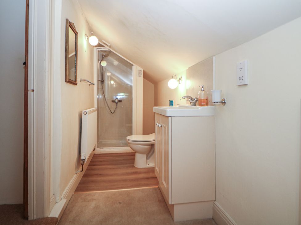 A bathroom with shower, toilet, and sink at Green Farm Stables Hognaston near Carsington Water