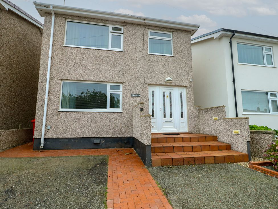A house with steps leading to the front door at Glasfryn in Holyhead