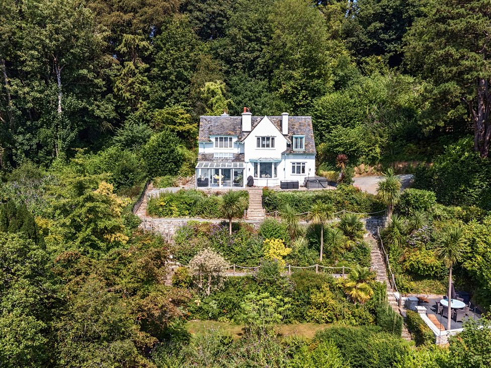 A house surrounded by greenery with a garden at Afallon in Menai Bridge