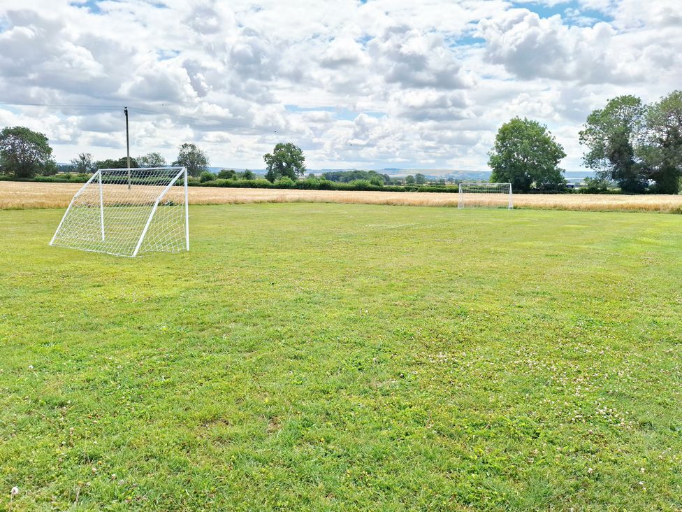 A soccer field with goals at Farm Yard Cottage in Allerston
