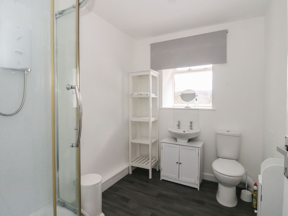 A bathroom with a shower and sink at Willow near Killean Farmhouse Cottages Inveraray