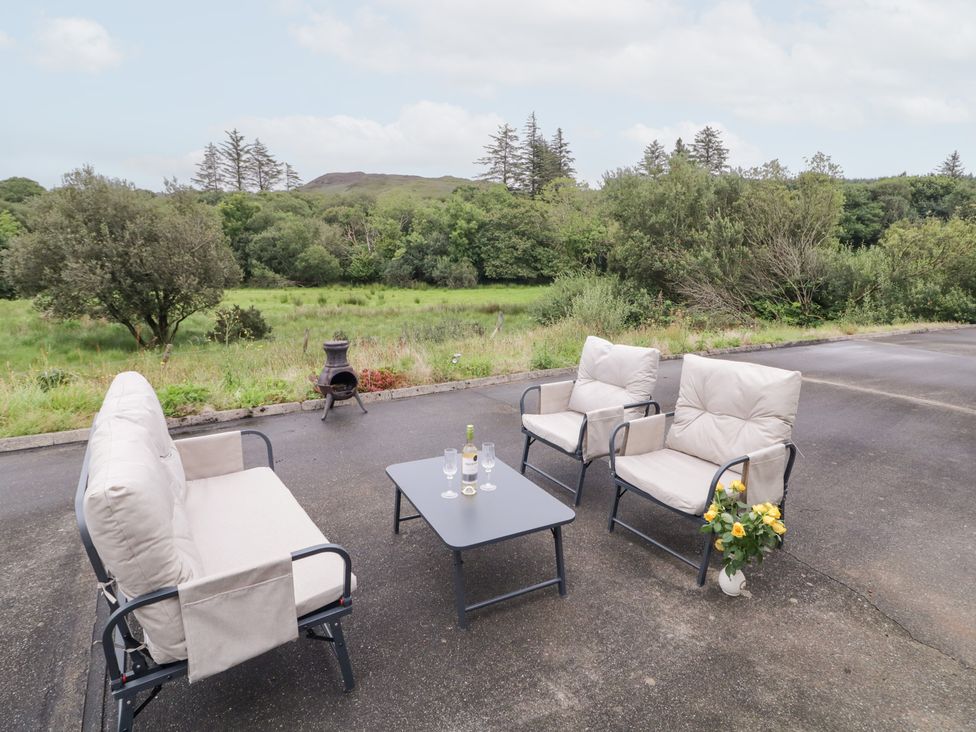 Outdoor seating arrangement with table and drinks at Ard na Gréine, Glenties, County Donegal