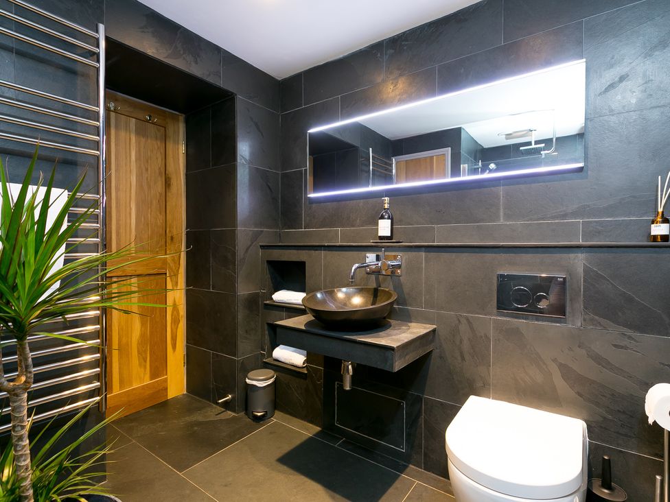 A bathroom with a sink and toilet at Scilly Stack in Penzance