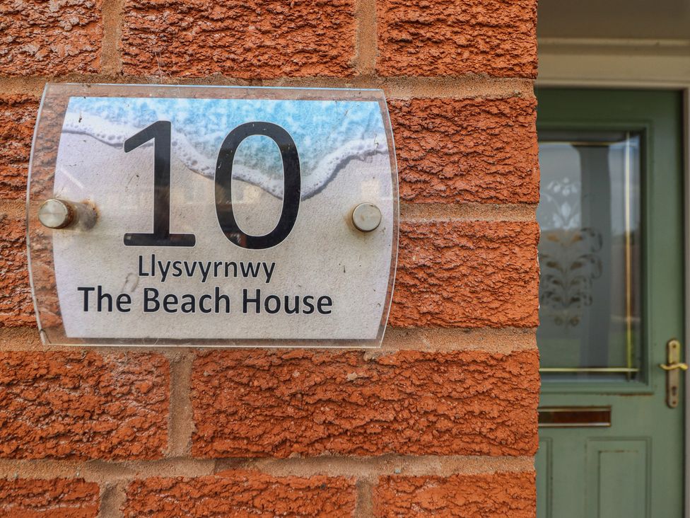 A number 10 nameplate on a brick wall at The Beach House in Prestatyn