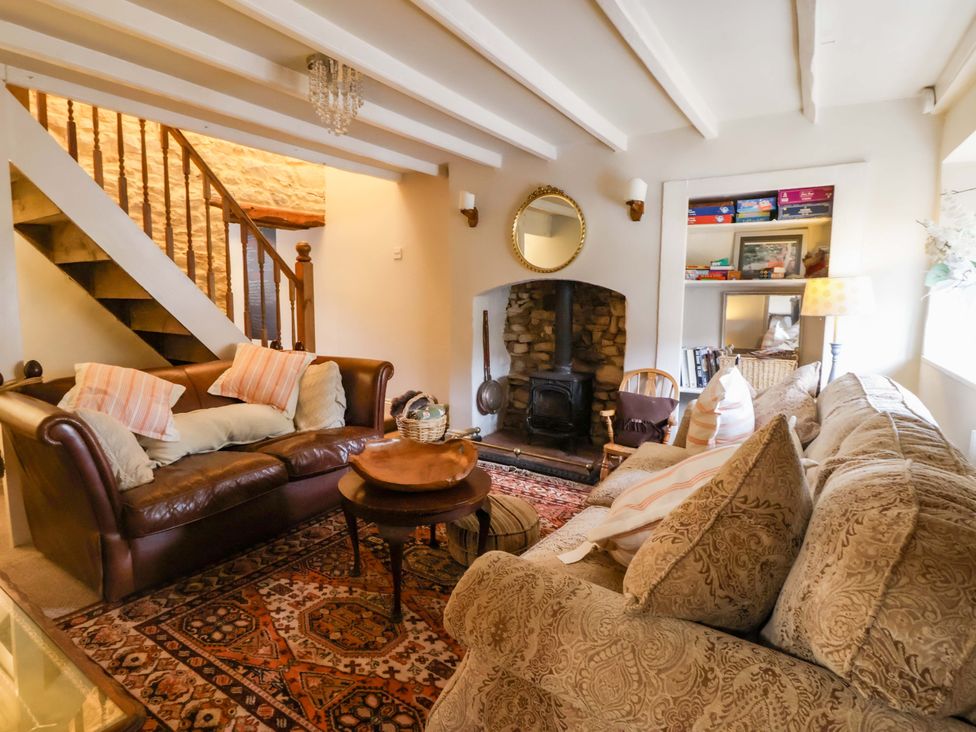 A living room with a sofa and fireplace at Dunning, The Mount in York