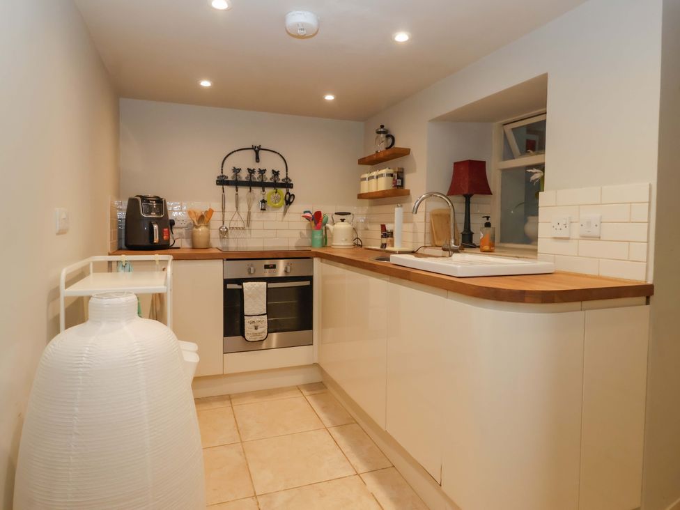 A kitchen with a sink and oven at Dunning, The Mount, York