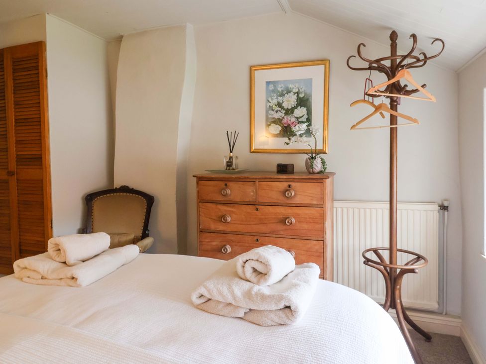 A bedroom with a bed and dresser at Dunning, The Mount York
