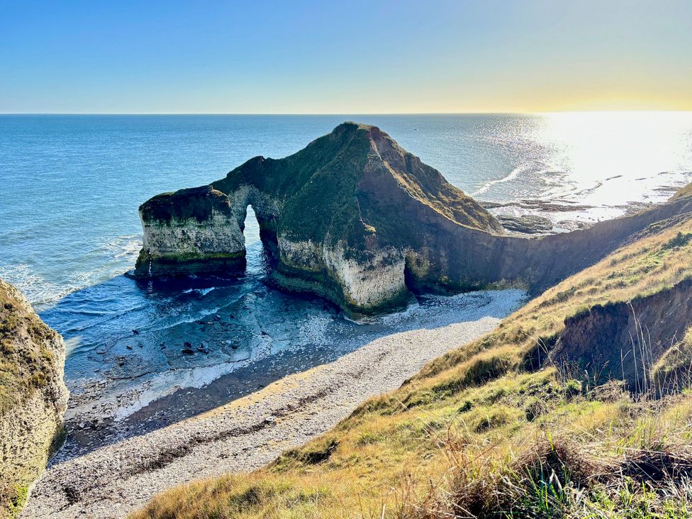 A coastal view featuring cliffs and an ocean at Bobbies' Retreat, 20 High Street, Bridlington
