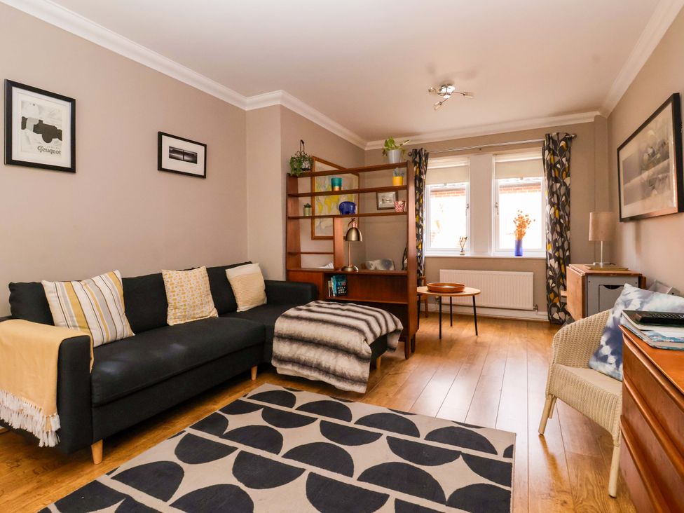 A living room with a sofa and coffee table at 8 Williamson Drive Ripon