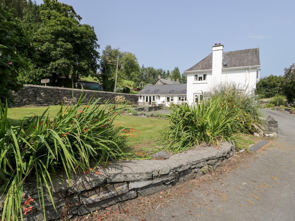 A house with garden and trees at Pengwern Bach in Llanrwst
