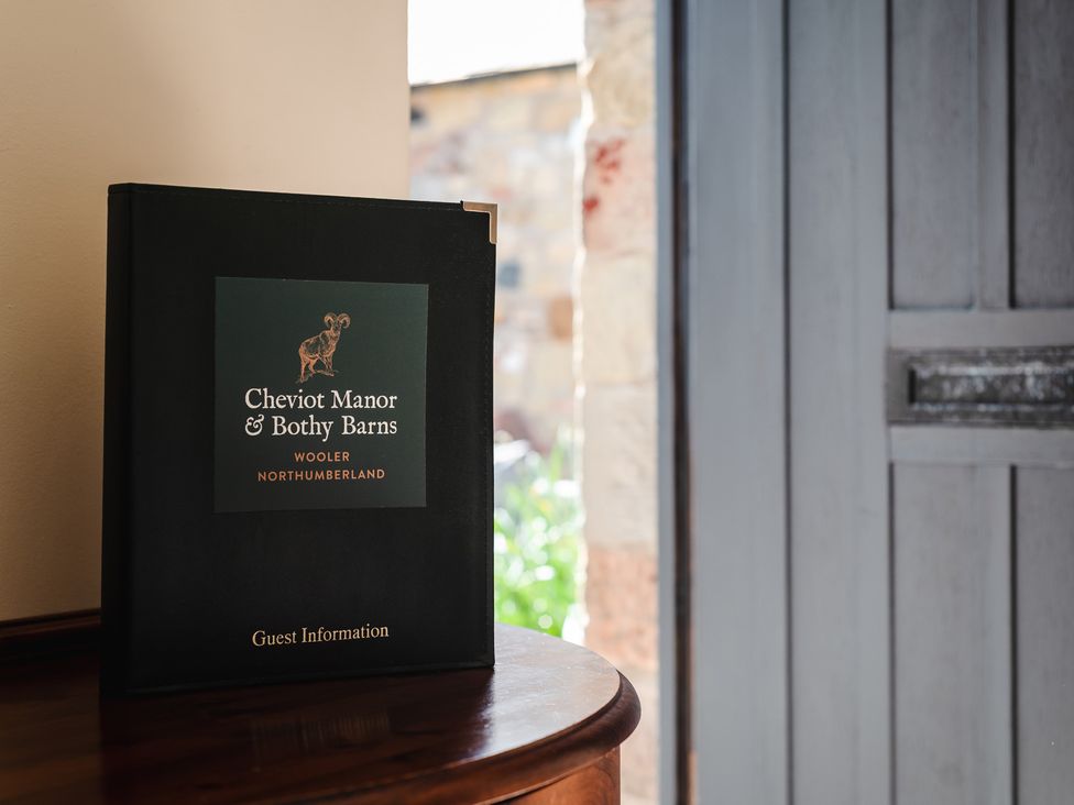 A guest information book on a table at Cheviot Manor in Wooler