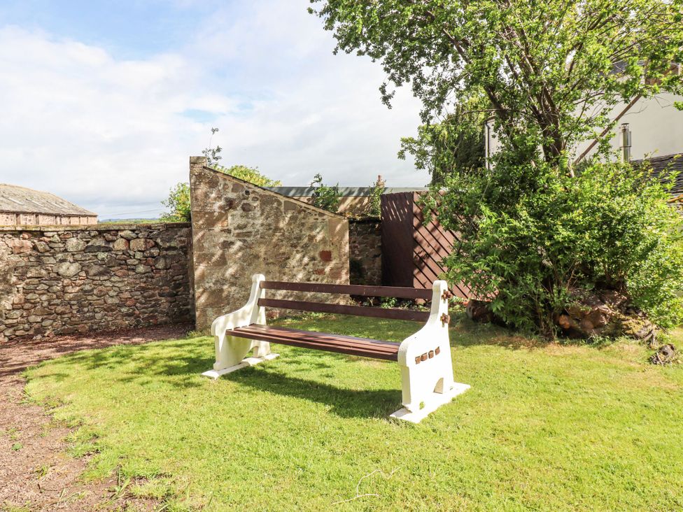 A bench in a garden at Hollyhock, Akeld near Wooler