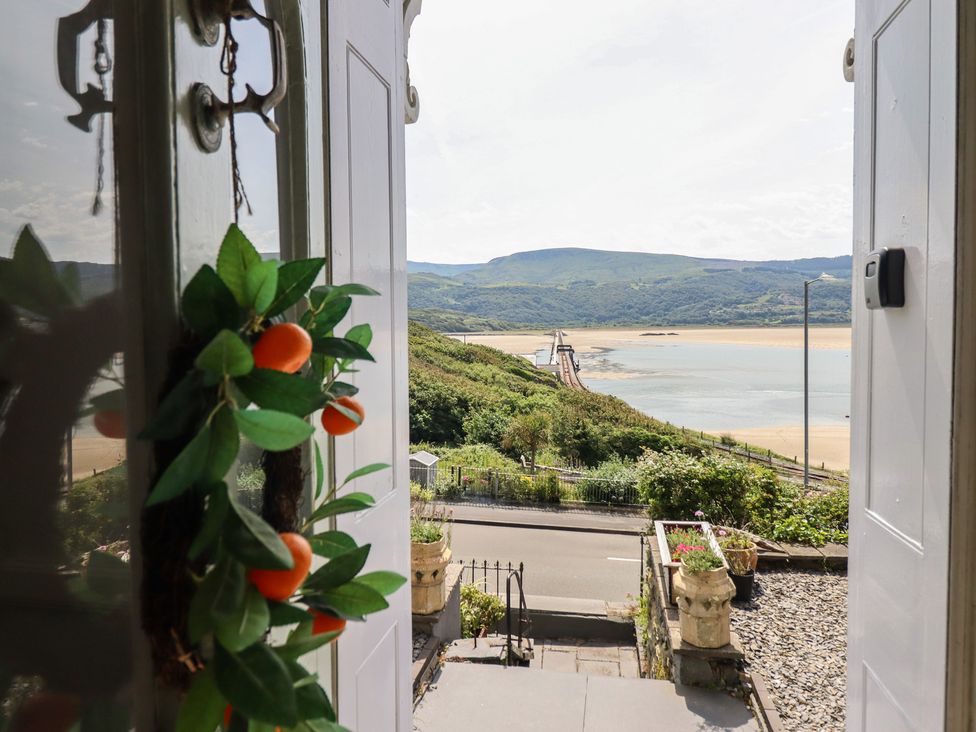 A view from the front door showing mountains and water at 5 Porkington Terrace in Barmouth