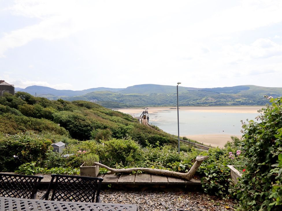 A view of sea and mountains from a garden at 5 Porkington Terrace Barmouth