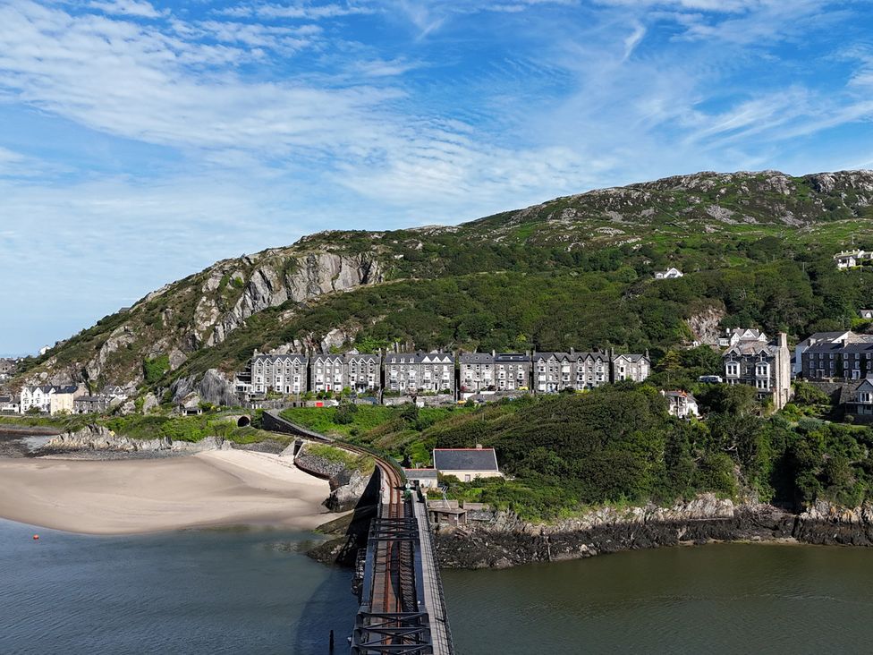 A view of houses along a coastal area at 5 Porkington Terrace Barmouth