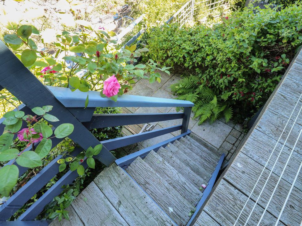Stairs leading down with plants and flowers at 46 Crowthers Hill Dartmouth