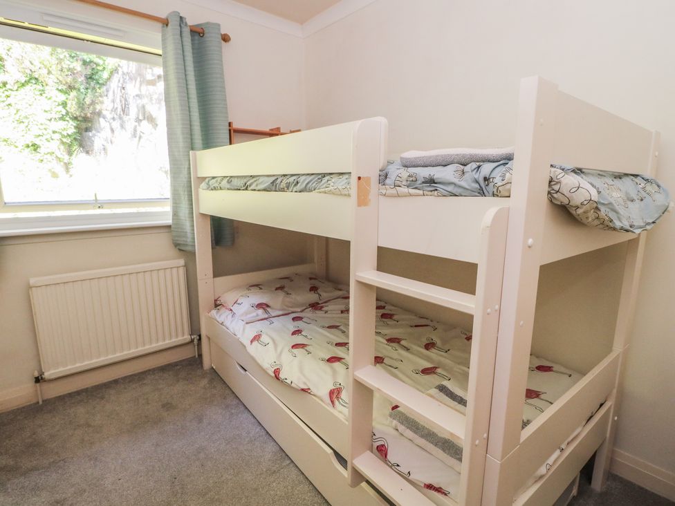 A bedroom with a bunk bed at Allt An Dorran in Salen