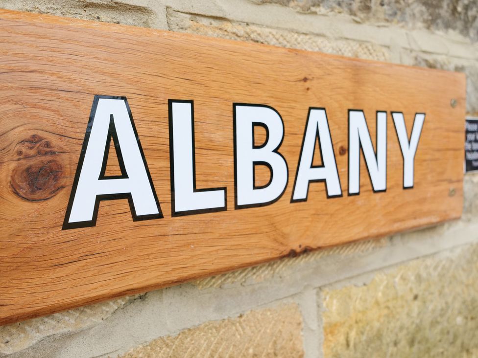 A sign displaying the name Albany at Albany @ Summerfield Farm in Hawsker