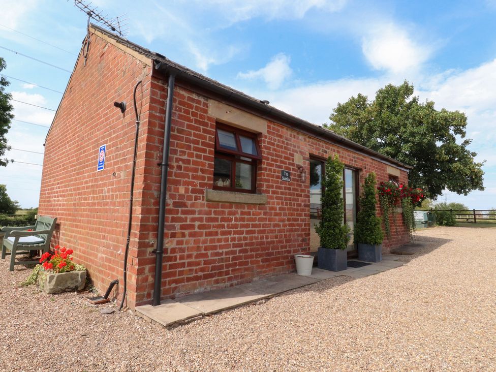 An exterior view of The Stables in Hall Green near Walmer Bridge