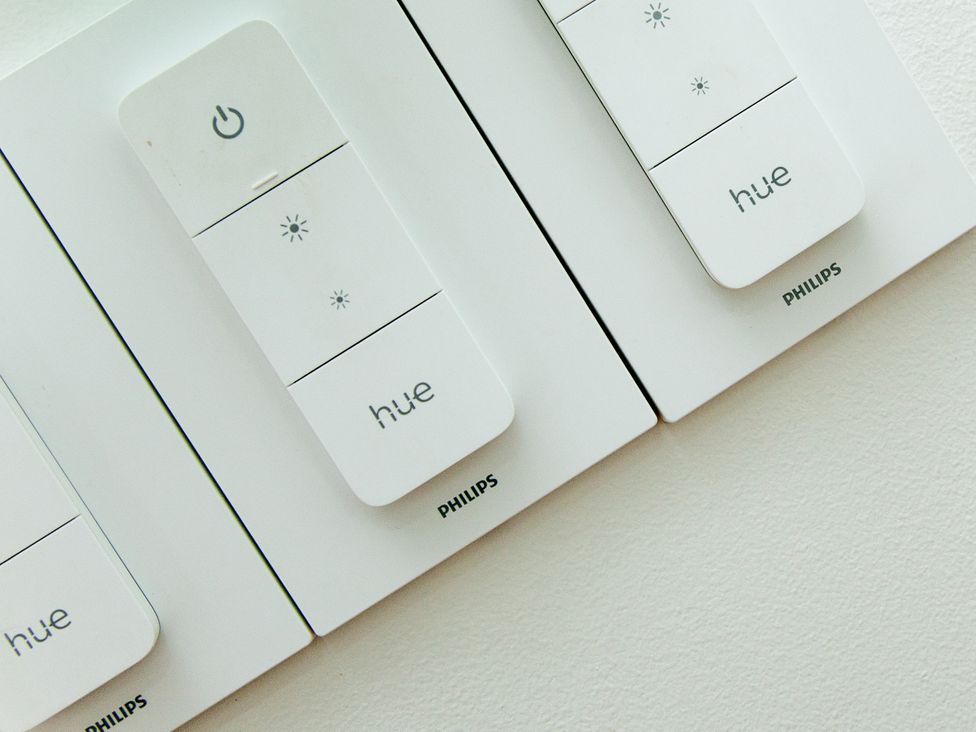 Philips Hue light control switches on a wall at Ultramarine in Carbis Bay