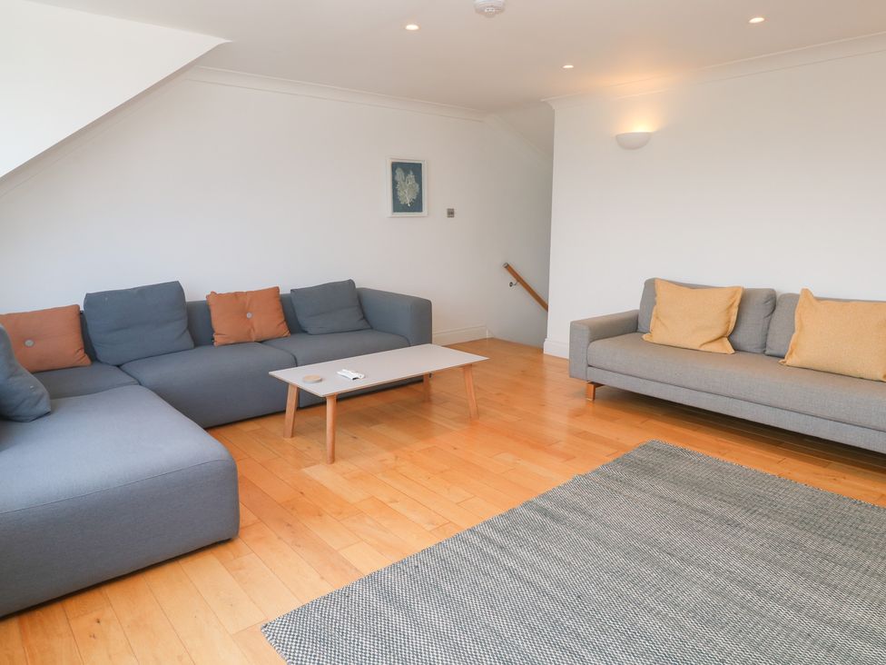A living room with sofas and a coffee table at Bayside in Carbis Bay