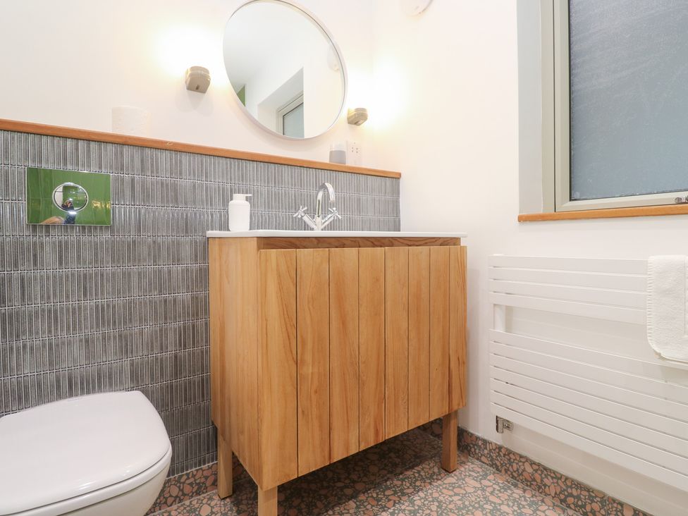 A bathroom with a sink and toilet at Bayside in Carbis Bay