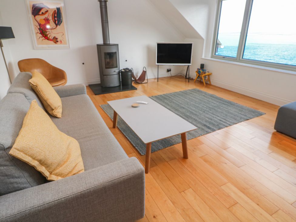 A living room with a sofa and coffee table at Bayside in Carbis Bay