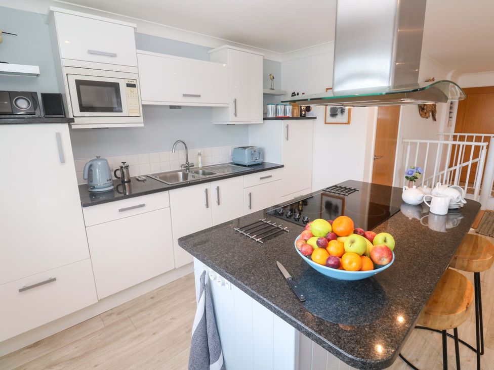 A kitchen with a fruit bowl and appliances at Sea Breeze in Carbis Bay